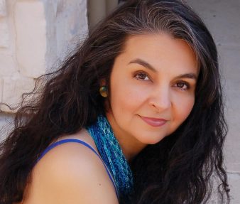 Headshot Amparo Garcia-Crow